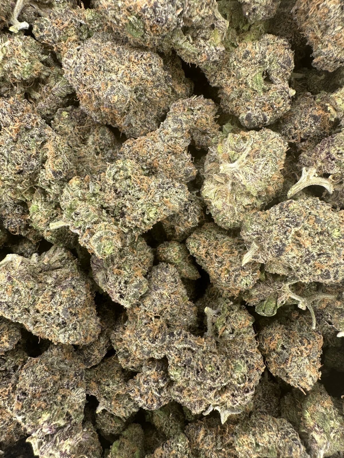 Granny Apple Hemp Flower buds in a bag. 