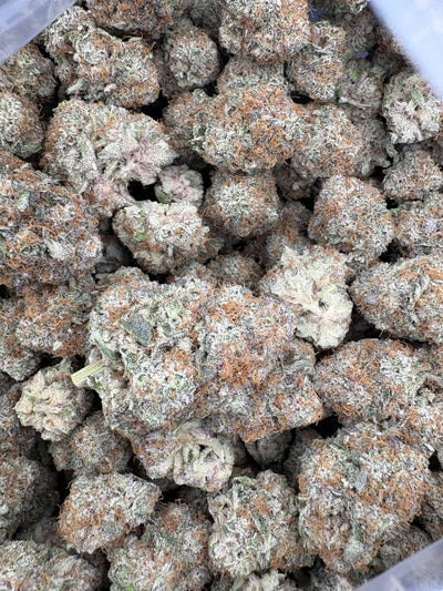 Watermelon Jealousy Hemp Flower  buds in a bag. 
